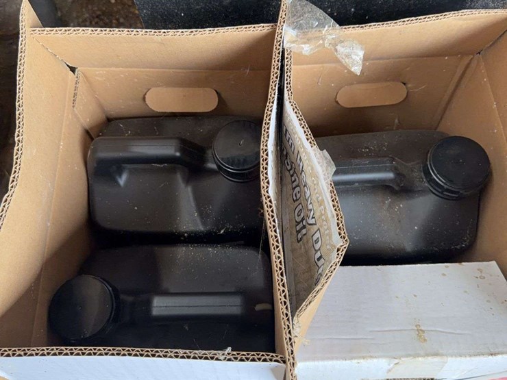 assorted-automotive-and-agricultural-lubricants,-fluids,-and-grease-cartridges-image-3