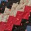 hand-tied-patchwork-quilt-with-multi-colored-fabric-blocks-image-3