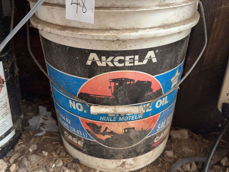 collection-of-assorted-lubricant-buckets-and-o's-gold-thermometer-image-4