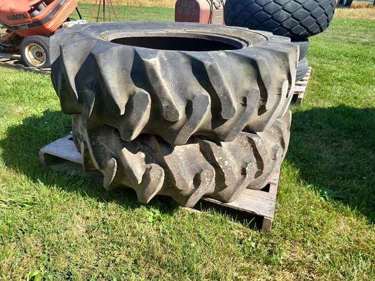 (1)-pair-of-12.4-24-tires-image-1