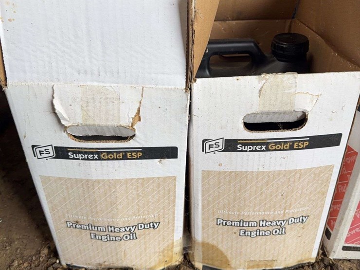 assorted-automotive-and-agricultural-lubricants,-fluids,-and-grease-cartridges-image-2
