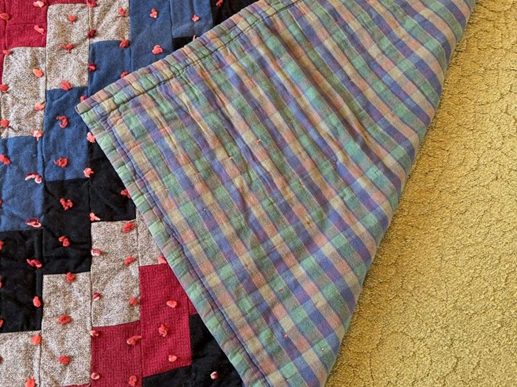 hand-tied-patchwork-quilt-with-multi-colored-fabric-blocks-image-2