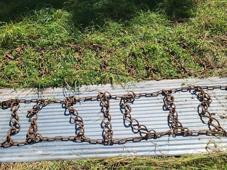 (1)-pair-of-tire-chains-off-of-14.9-38-tires-image-7