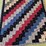hand-tied-patchwork-quilt-with-multi-colored-fabric-blocks-image-1
