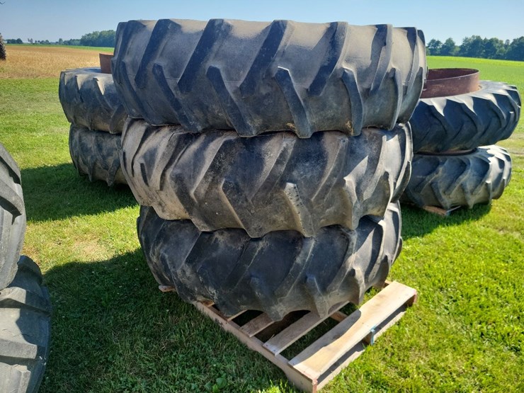(1)-pair-of-18.4-34-t-rail-duals-and-(1)-18.4-34-tire-image-1