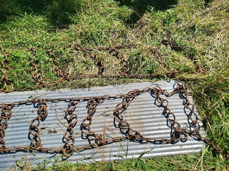 (1)-pair-of-tire-chains-off-of-14.9-38-tires-image-8