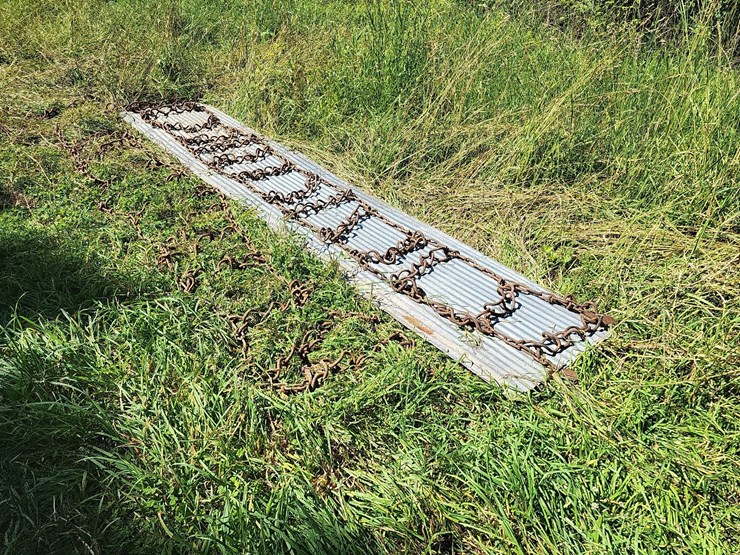 (1)-pair-of-tire-chains-off-of-14.9-38-tires-image-3