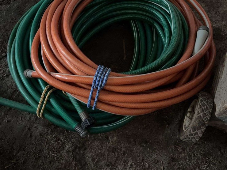 wheeled-battery-charger-and-assorted-garden-hoses-image-5