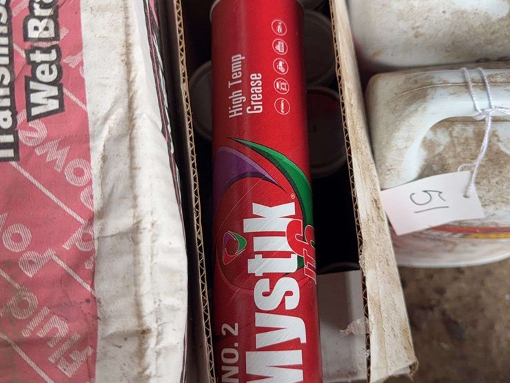 assorted-automotive-and-agricultural-lubricants,-fluids,-and-grease-cartridges-image-7