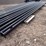 #1415-•-(4)-light-poles-approx-30'-long,-approx-5"-dia---unused-image-1