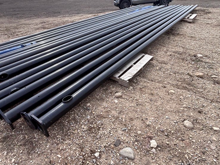 #1415-•-(4)-light-poles-approx-30'-long,-approx-5"-dia---unused-image-1
