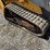 2016-deere-317g-image-13