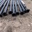 #1415-•-(4)-light-poles-approx-30'-long,-approx-5"-dia---unused-image-3