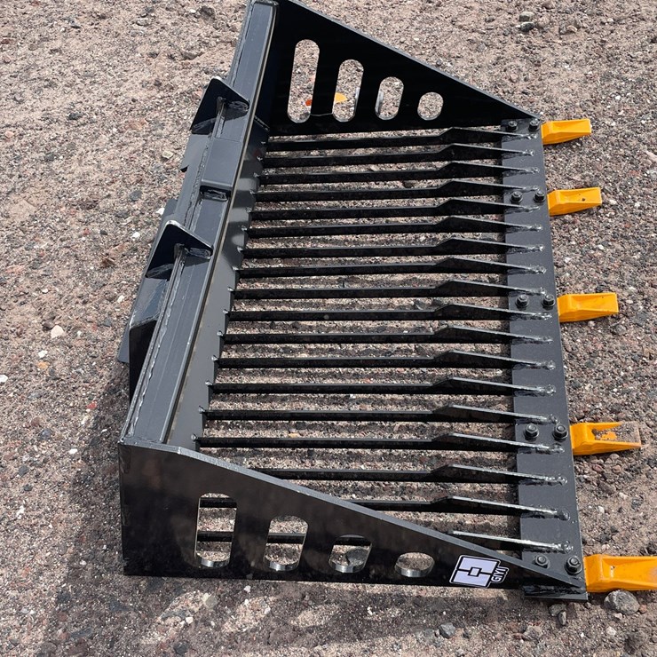 #1313 • Mini Skid Steer Rock Bucket