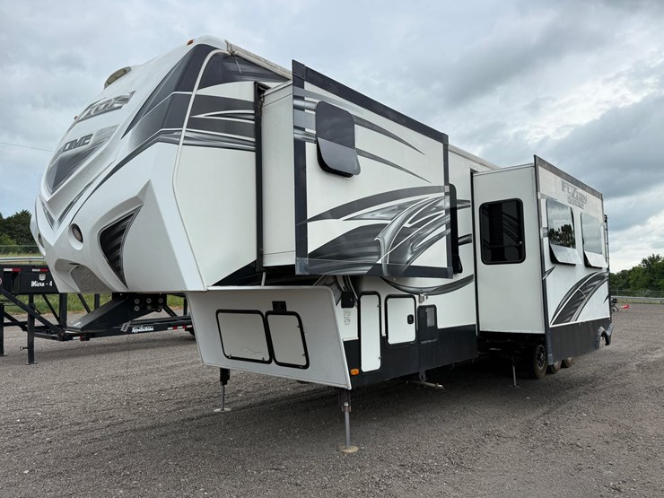 #56-•-2014-fabrique-41'-5th-wheel-toy-hauler-image-1