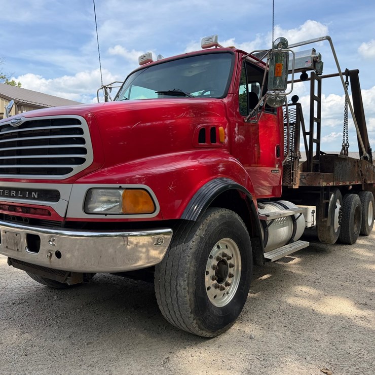 #1510 • Sterling Quad Axle Rolloff Truck