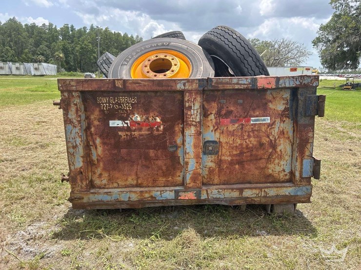 dumpster-with-tires-image-13