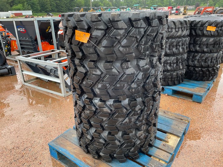 #14627-•-set-of-(4)-12-16.5-skid-steer-tires-(mosinee,-wi)-image-1