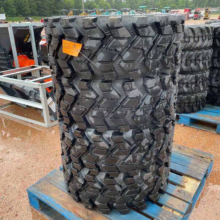 #14627 • Set of (4) 12-16.5 Skid Steer Tires (Mosinee, WI)