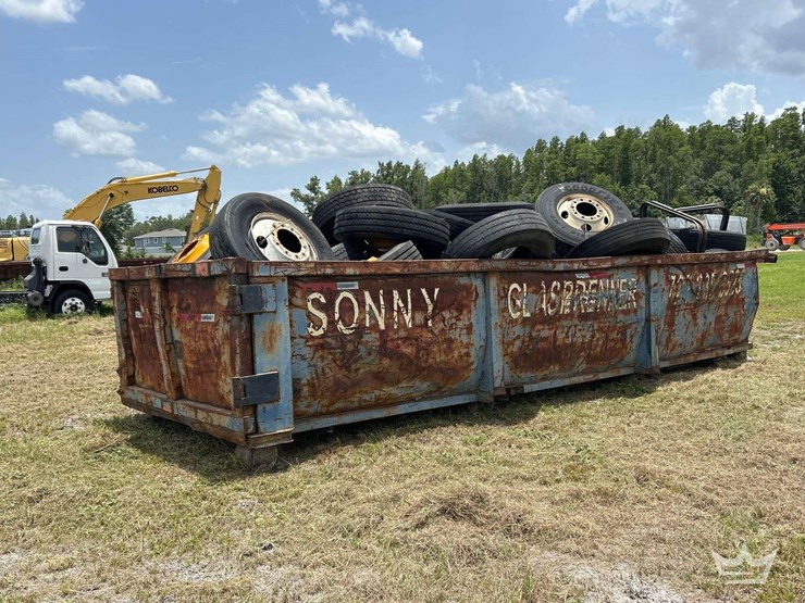 dumpster-with-tires-image-3