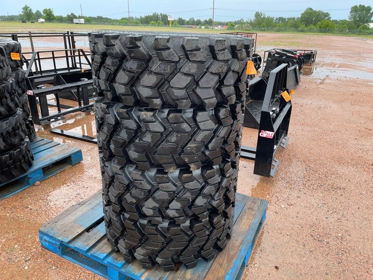 #14627-•-set-of-(4)-12-16.5-skid-steer-tires-(mosinee,-wi)-image-2