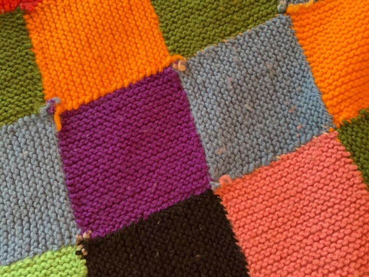 hand-knitted-multi-colored-patchwork-blanket-image-4