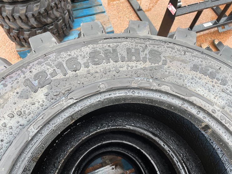 #14627-•-set-of-(4)-12-16.5-skid-steer-tires-(mosinee,-wi)-image-6