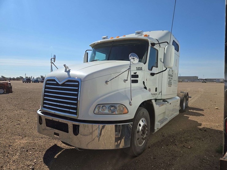 2014-mack-cxu613-600-tandem-axle-dual-cab-behind-engine-truck-tractor-image-1