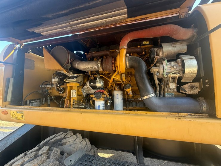 #1298-•-caterpillar-m318d-material-handler-image-26