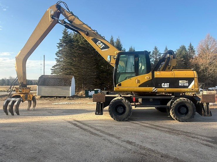 #1298-•-caterpillar-m318d-material-handler-image-2