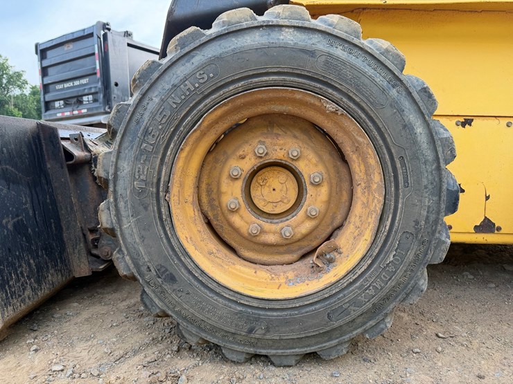 #4069-•-new-holland-ls180-wheeled-skid-steer-image-63