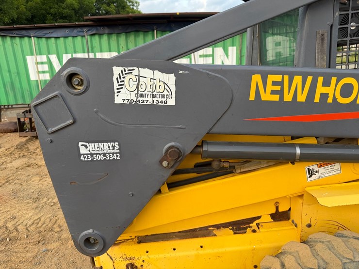 #4069-•-new-holland-ls180-wheeled-skid-steer-image-32