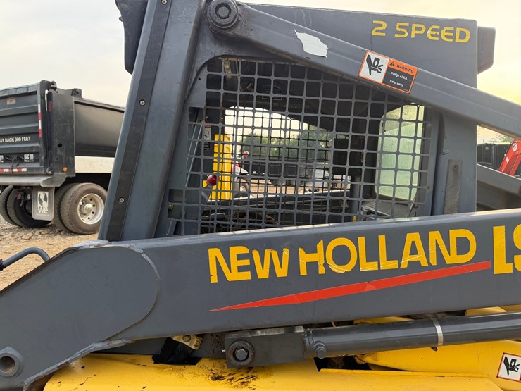 #4069-•-new-holland-ls180-wheeled-skid-steer-image-21