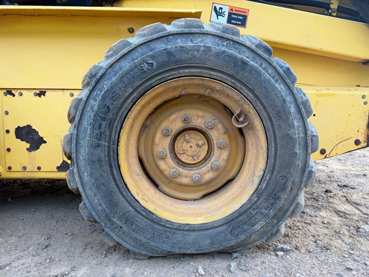 #4069-•-new-holland-ls180-wheeled-skid-steer-image-65