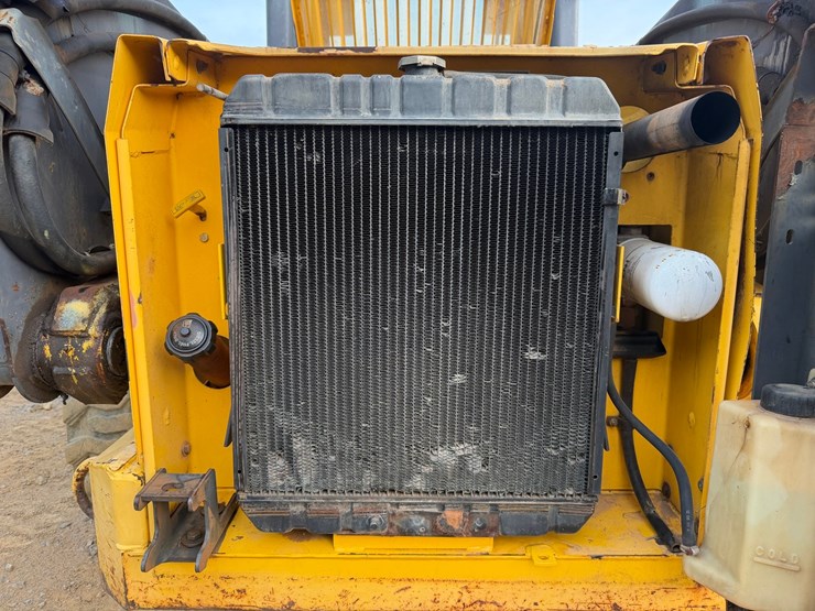 #4069-•-new-holland-ls180-wheeled-skid-steer-image-39