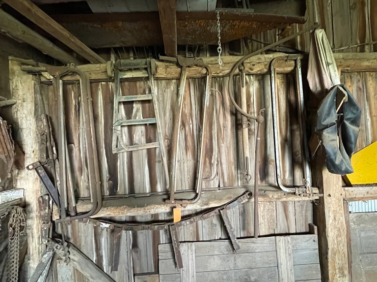 #2320-•-wall-section-of-vintage-farm-tools-image-1