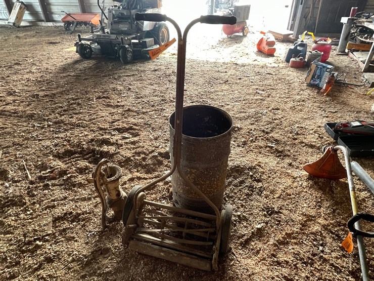 #2289-•-rotary-mower,-hand-pump,-and-26"-barrel-image-1