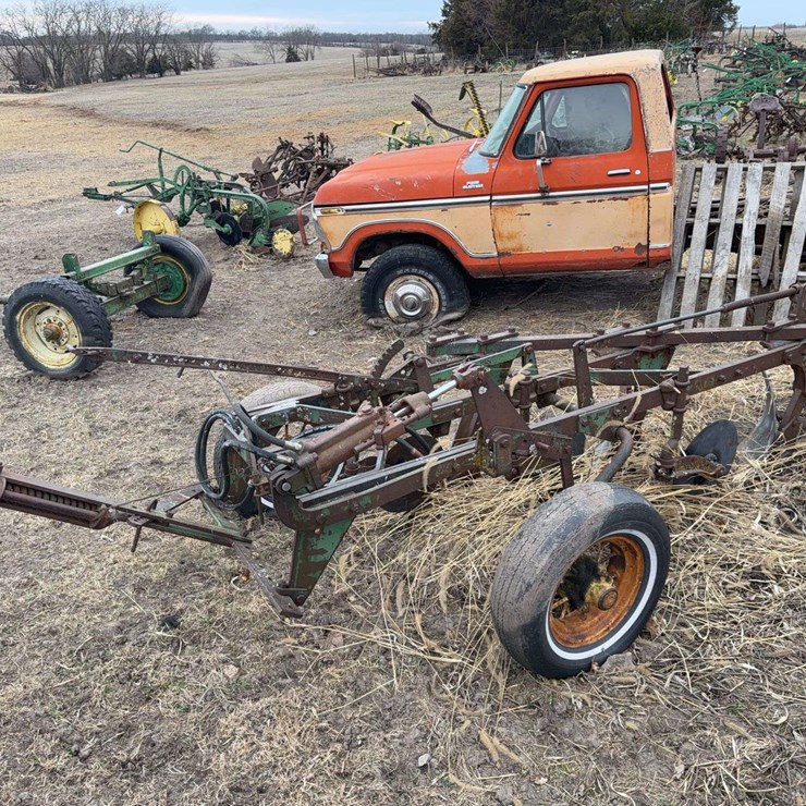 John Deere Pull Type Three Bottom Plow.