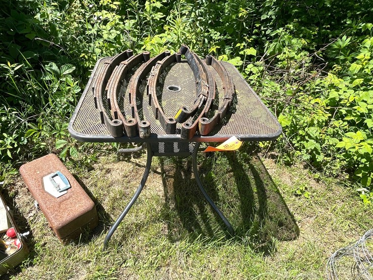 #3303-•-metal-table-and-(7)-trailer-springs-image-1