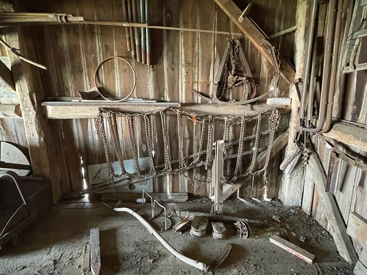 #2319-•-wall-section-of-vintage-farm-tools-image-1