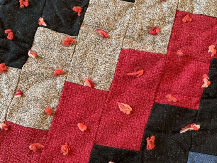 hand-tied-patchwork-quilt-with-multi-colored-fabric-blocks-image-3