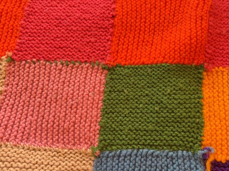 hand-knitted-multi-colored-patchwork-blanket-image-5