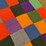hand-knitted-multi-colored-patchwork-blanket-image-3
