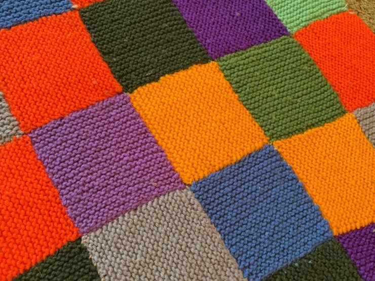 hand-knitted-multi-colored-patchwork-blanket-image-3