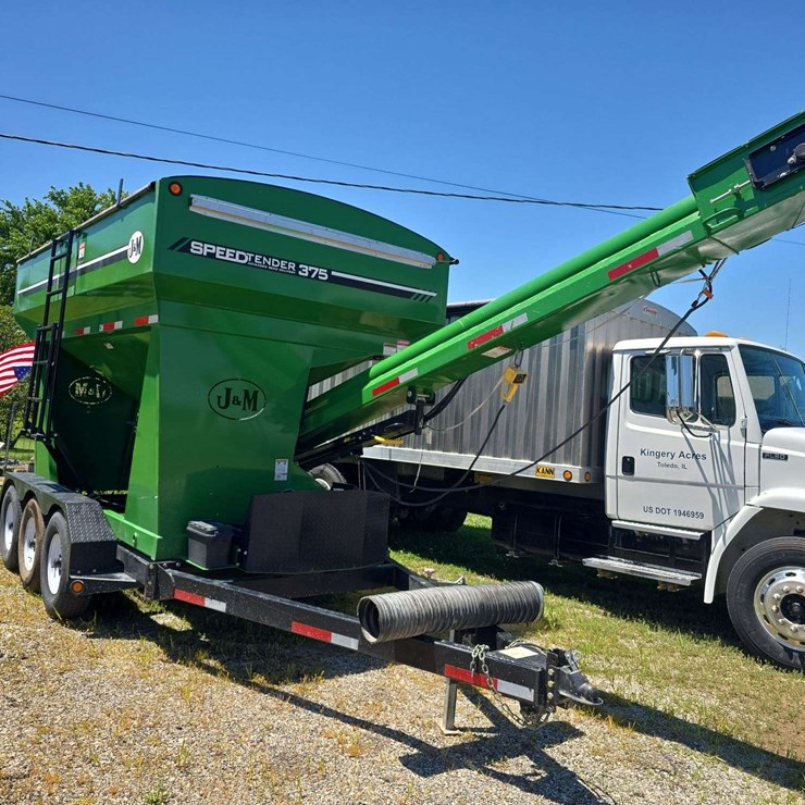 J&M 375 Seed Tender, Hyd Door Open, Triple Axle, Electric Start, with remote control start and swing and boom control, Honda GX 40 Engine, 650Xl Scales, Roll Tarp, Avery Weight Tronix, bumper hitch pull