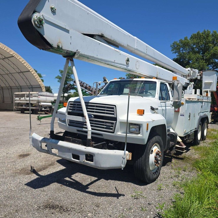 1992 Ford 8000 Bucket Truck, Tandem Axle, Outriggers on front and rear, Automatic, Air Brakes, Does work and run, used this spring, David Elliot Bed, 65ft reach, 65,414 miles, with winch cable, have to run control on frame, no bucket controls