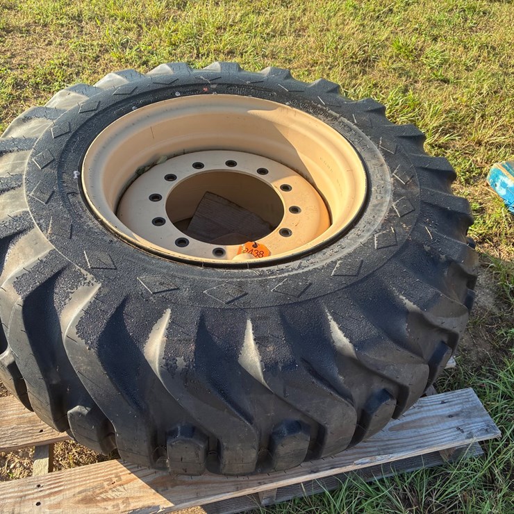 #2438 • New 17x25 goodyear tires on 12 hole wheels