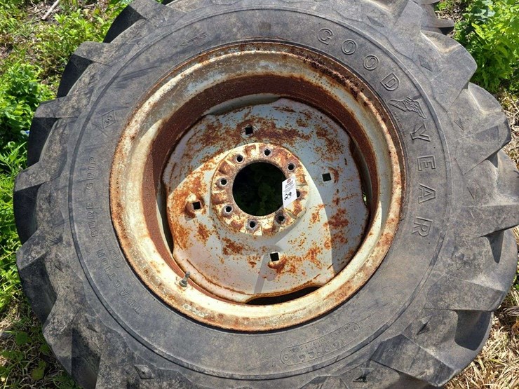 pair-of-good-year-16.9-26-tires-on-8-lug-rims-image-1