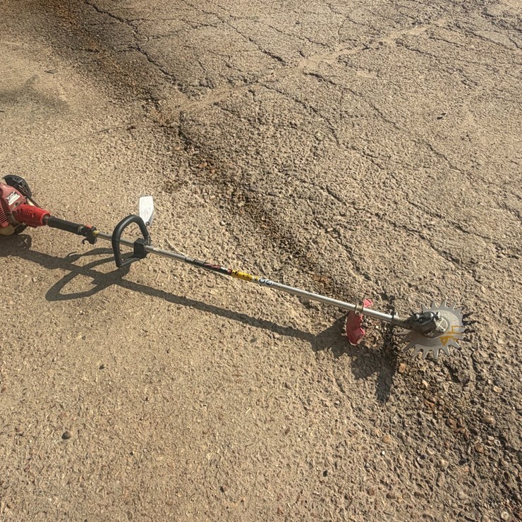 #46 • REDMAX ZENOALT WEEDEATER WITH SAW BLADE ATTACH