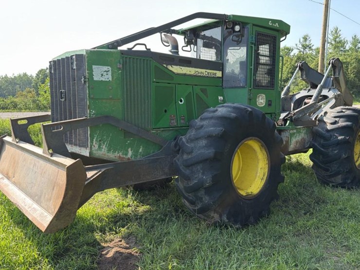 2015-deere-648l-image-1